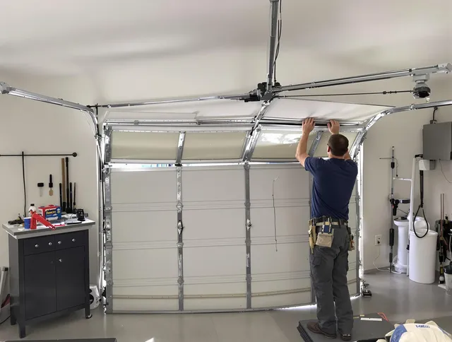 Orange Garage Door Repair specialist performing precise section replacement on Orange garage door